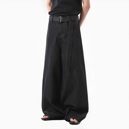 Black high waist straight leg denim jeans on a neutral background.