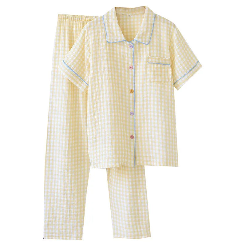 Women's yellow plaid crepe cotton short-sleeved top and loose trouser set for summer.