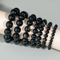 Hand-woven obsidian couple bracelet set with year of birth engraving in ethnic unisex style