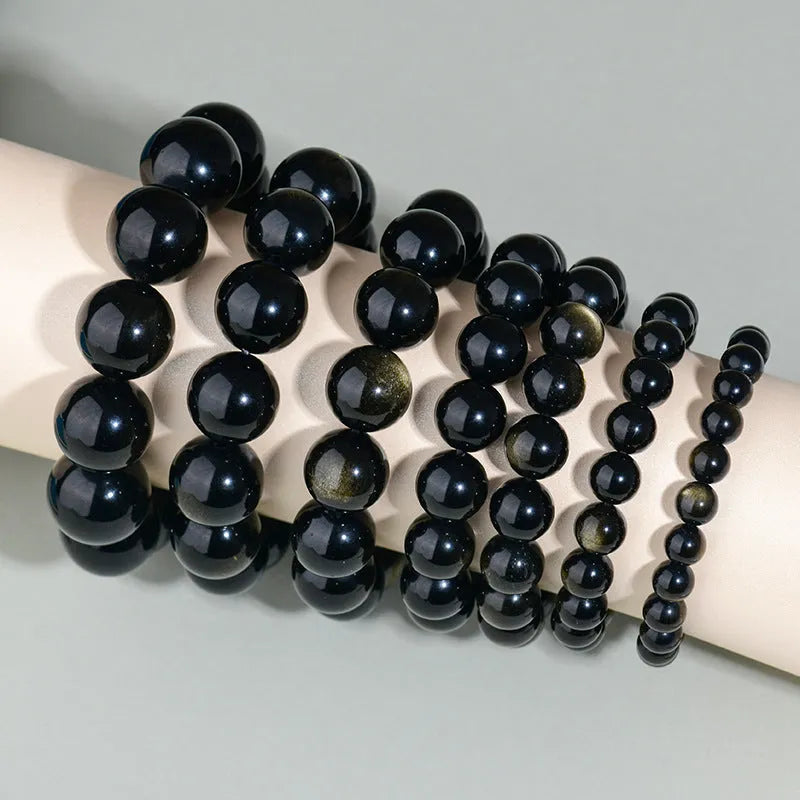 Hand-woven obsidian couple bracelet set with year of birth engraving in ethnic unisex style