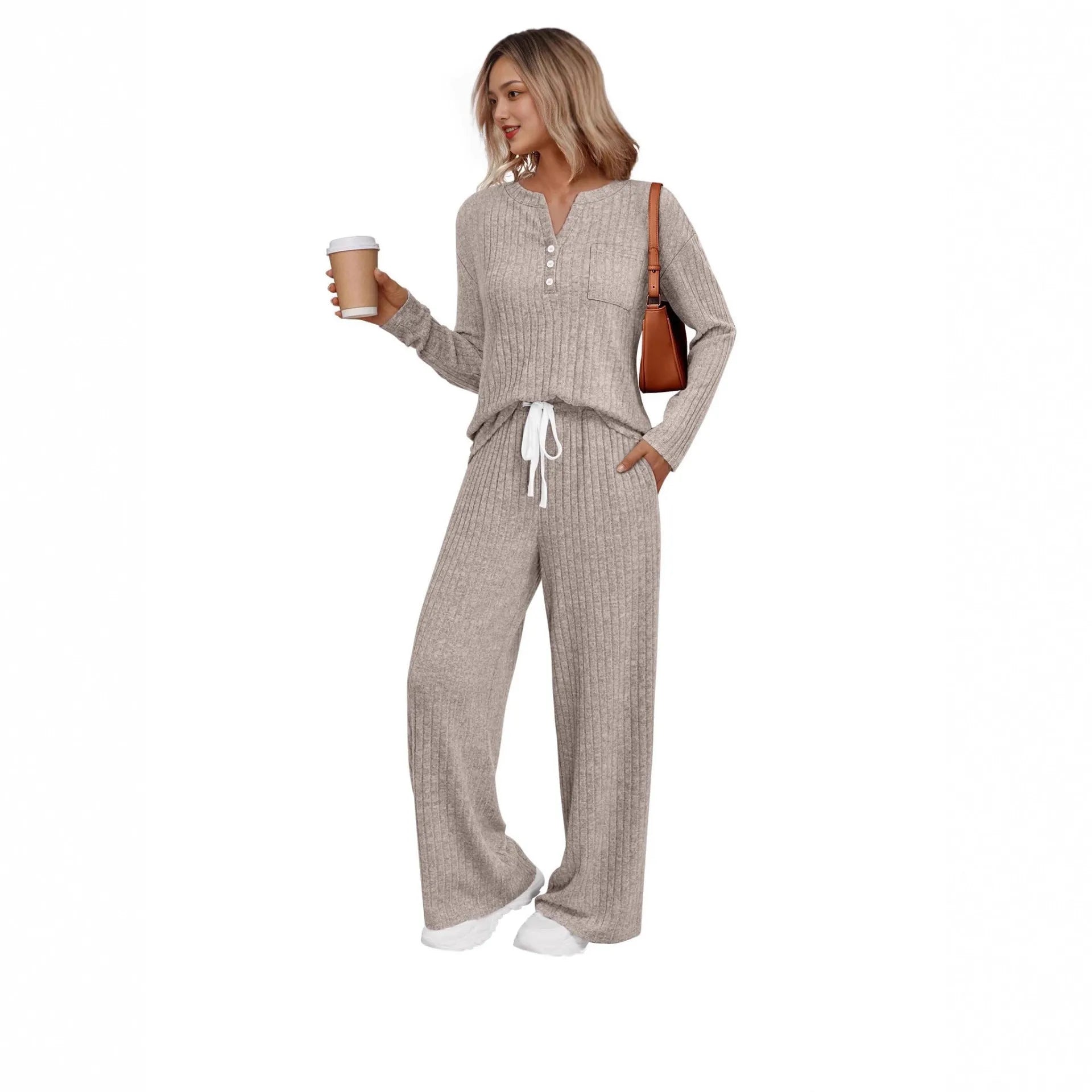 Women's striped knit V-neck long coat in light grey with matching pants, showing lace-up details