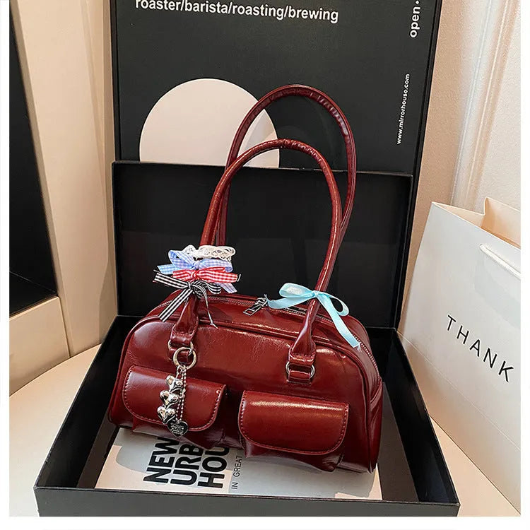 Retro pillow-shaped women's handbag in PU leather with double shoulder strap