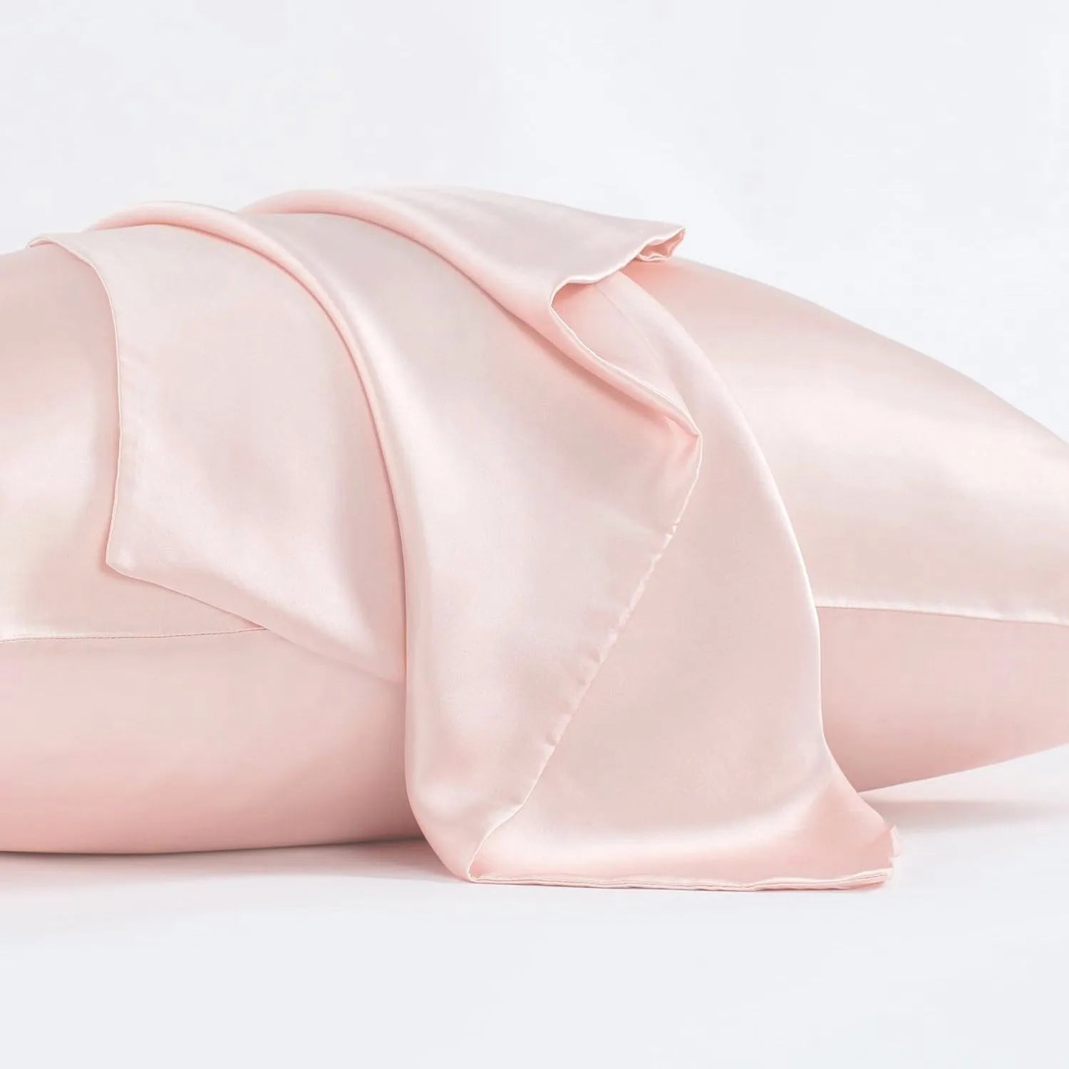 Dark grey 19 momme mulberry silk pillowcase with an envelope closure, laid flat.