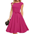 Sleeveless black midi dress with a lace-up waist tie and a full, oversized swing skirt.