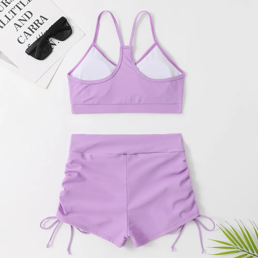 Women's high waist split swimsuit bikini in purple and black colours with spandex and nylon lining