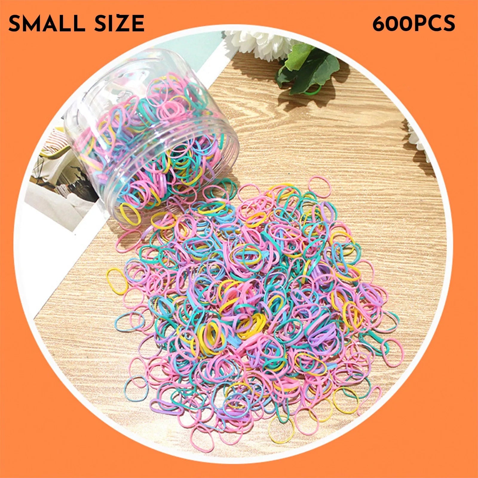 Assortment of colourful thin TPU baby hair ties in a clear reusable plastic container.