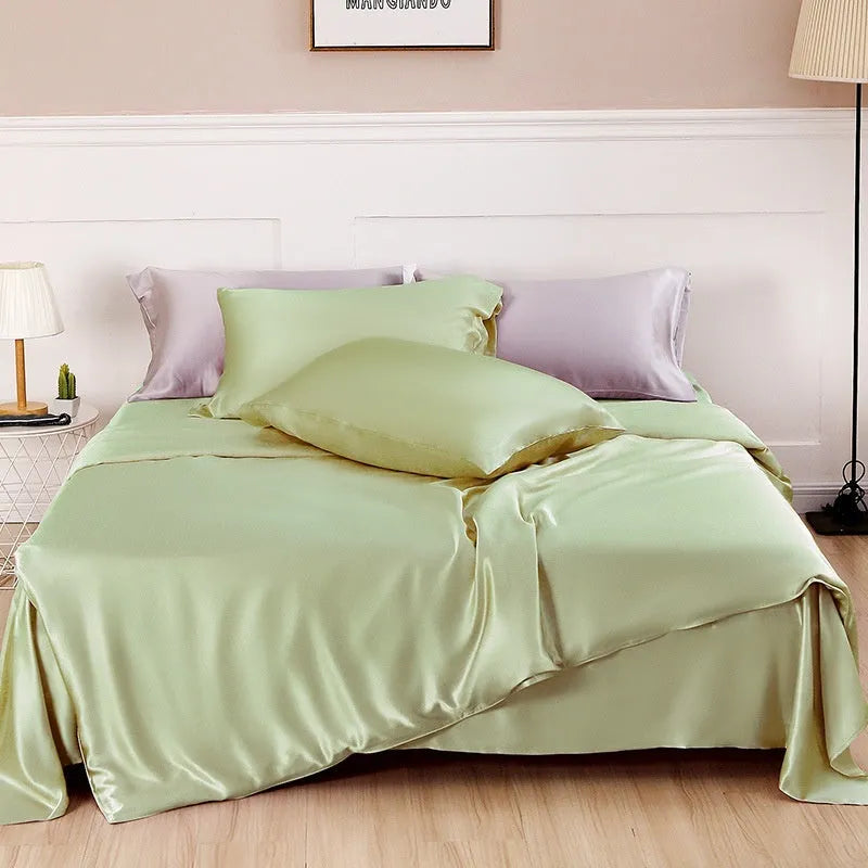 Solid colour double-sided silk duvet cover in bright brown, showing smooth texture and neat corner.