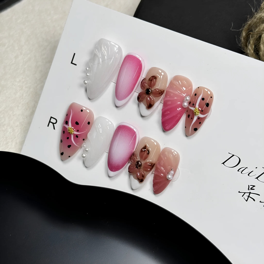 Hand-painted three-dimensional embossed nail art patches in candy colours, showing almond shape.