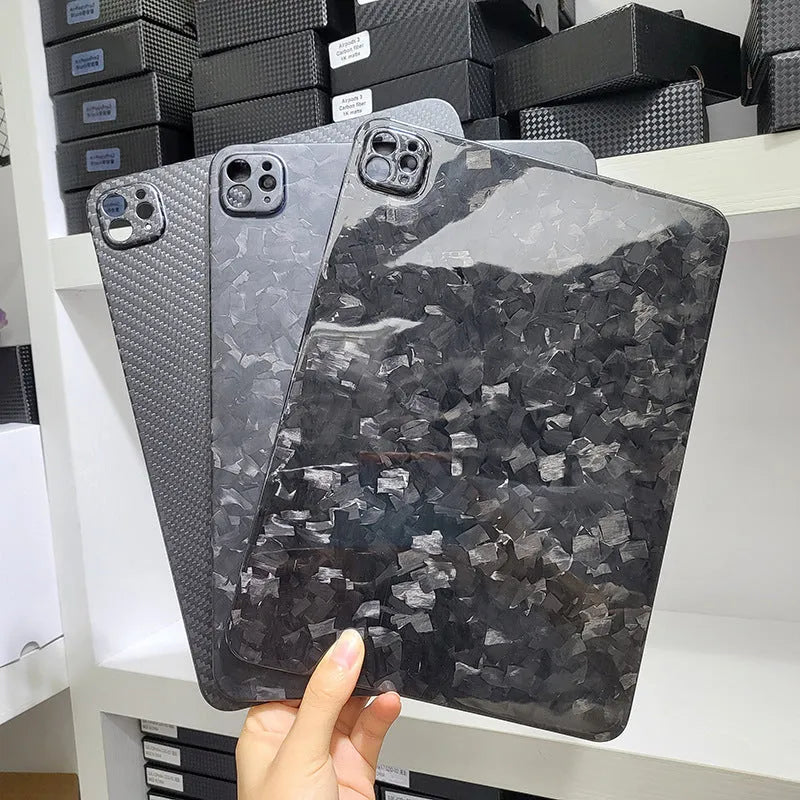 Genuine carbon fibre hard protective case for Apple iPad Pro 11 tablet in matte and forged finishes.