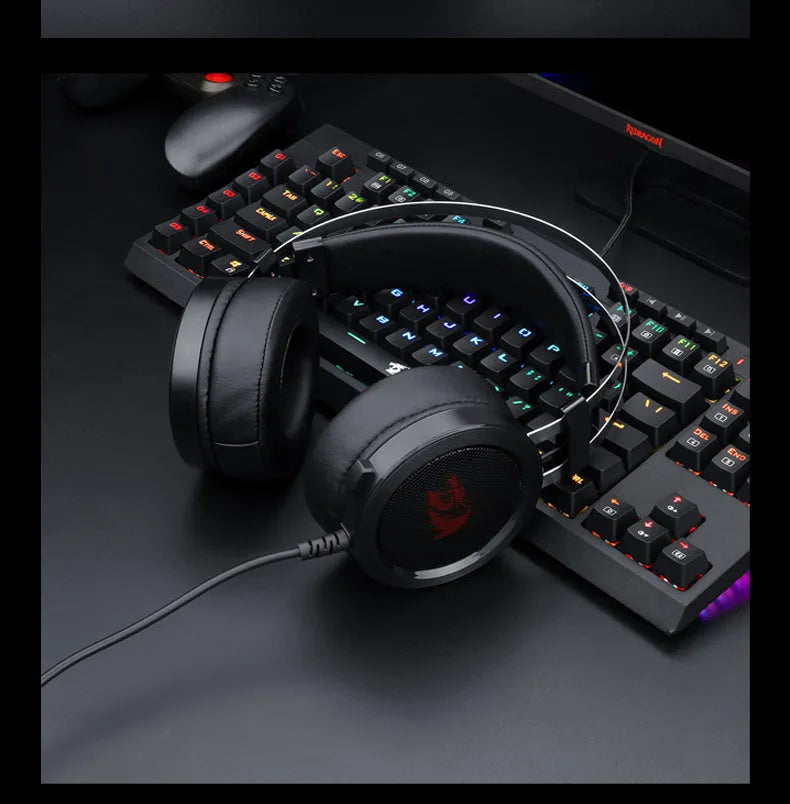 Black wired over-ear computer gaming headset with 2 metre cable and 3.5mm audio jack connector