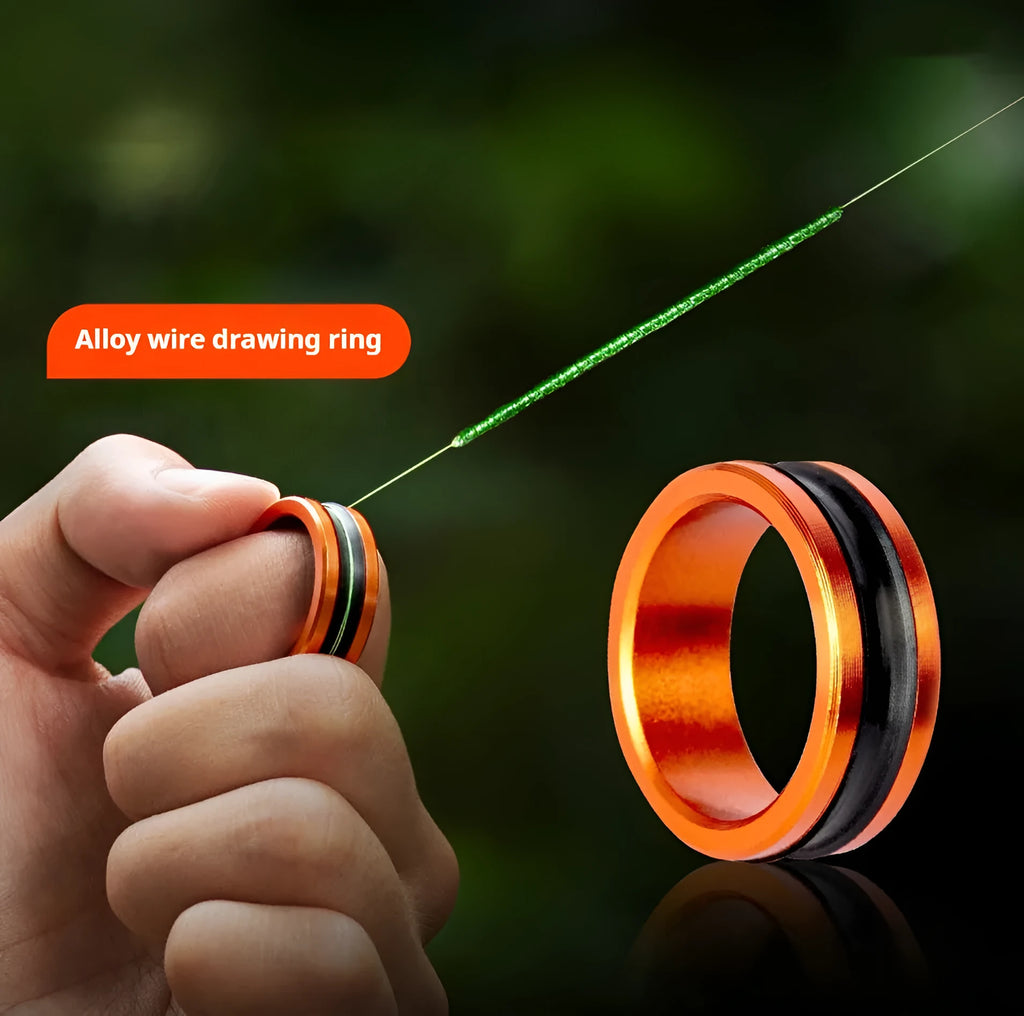 Orange and silver alloy fishing hand guard pull tool with non-slip grip surface