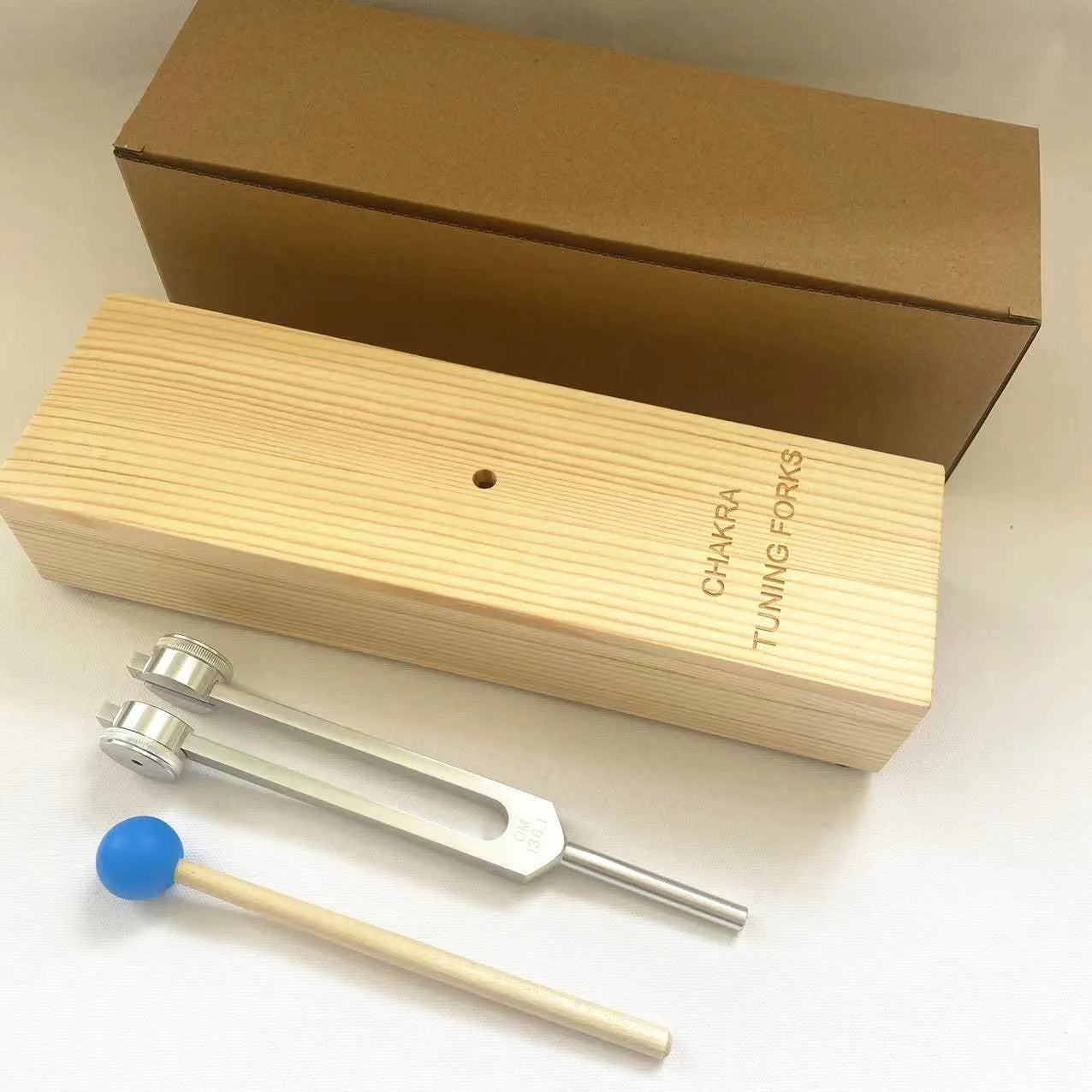 Aluminium alloy tuning fork and speaker set in kraft paper box for 432Hz or 258 frequency.