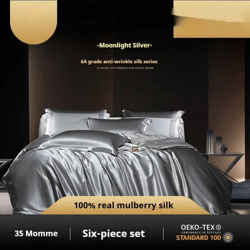 Solid colour silk four-piece quilt cover set shown in champagne gold colour