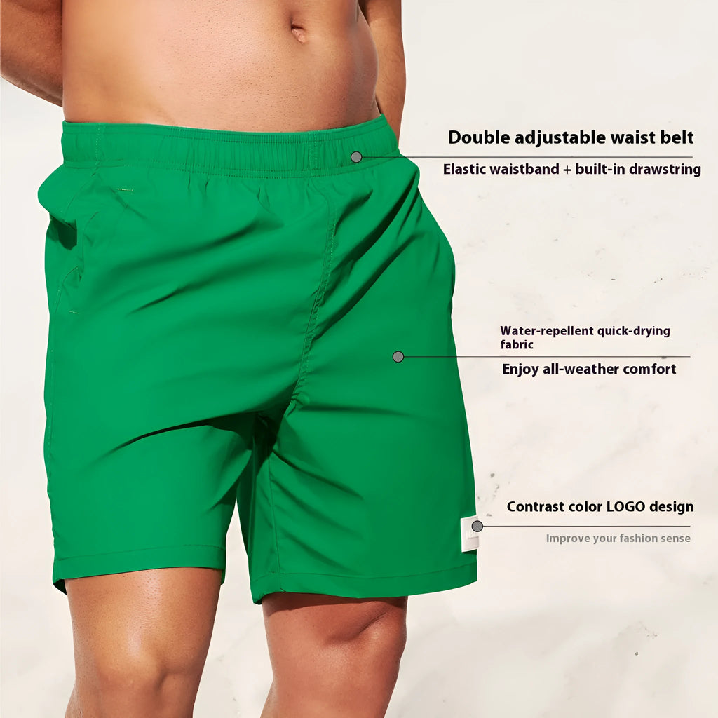 Men's quick-dry nylon sports shorts in solid colours with straight leg design