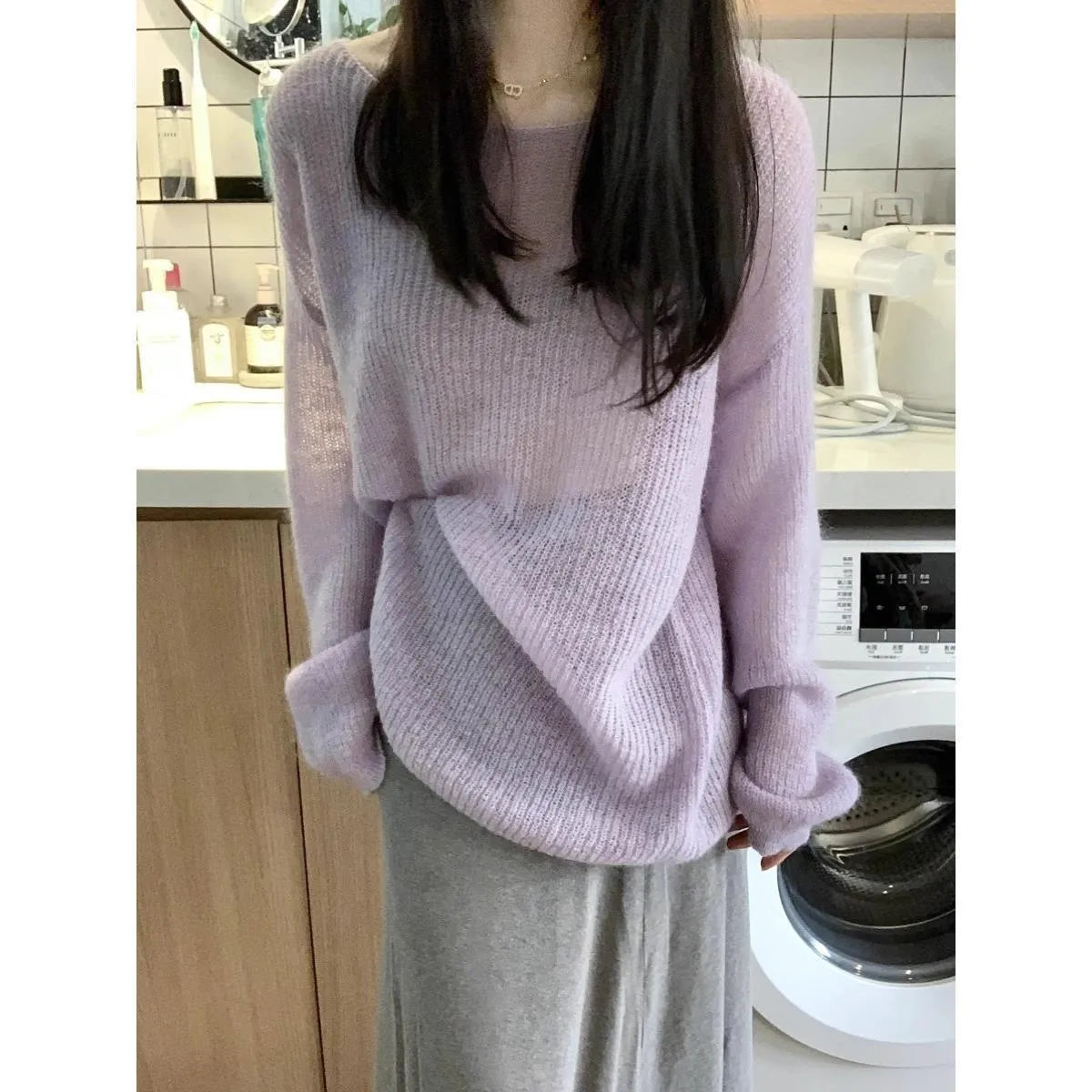 Purple women's loose hollow out blouse with princess sleeves, made from ice silk fabric.
