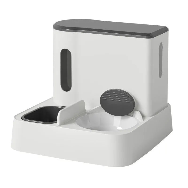 Grey automatic cat feeder and water dispenser double bowl unit on floor