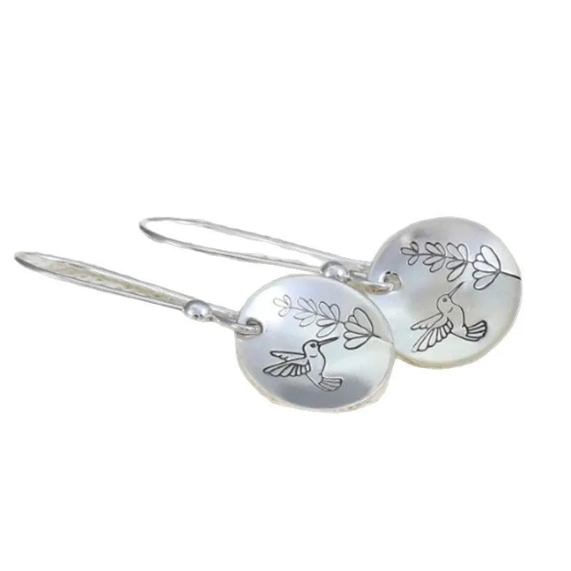 Silver retro bird motif glossy round women's earrings with leaf designs