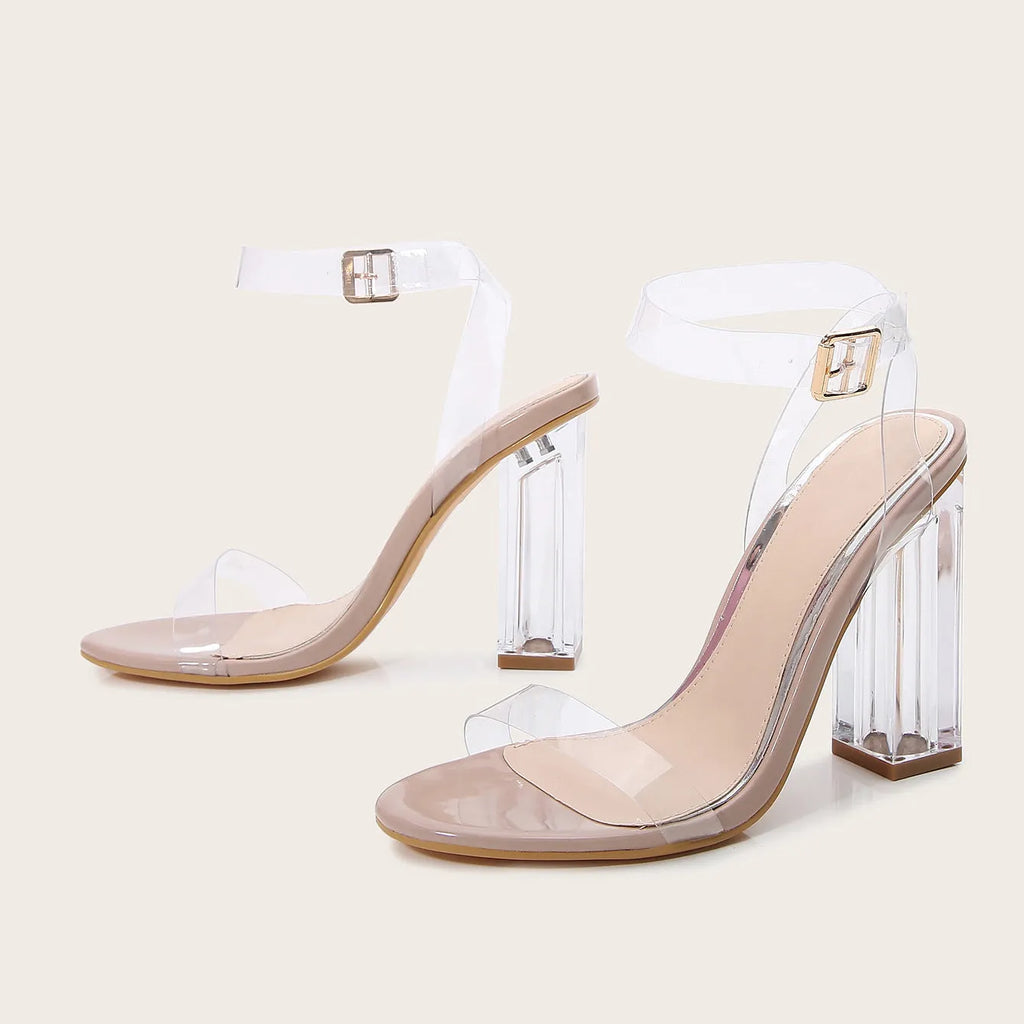Apricot coloured women's high heel sandals with clear PVC glass heel and silver buckle closure on a round toe.