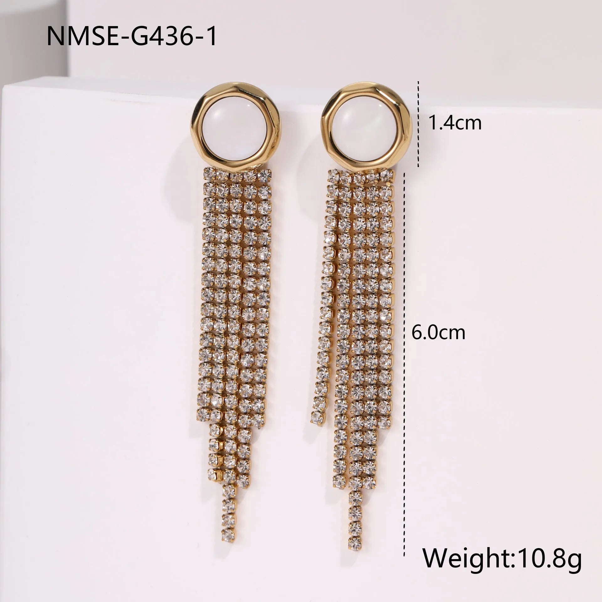 Gold plated stainless steel earrings with love heart and star geometric shapes and diamond tassel details