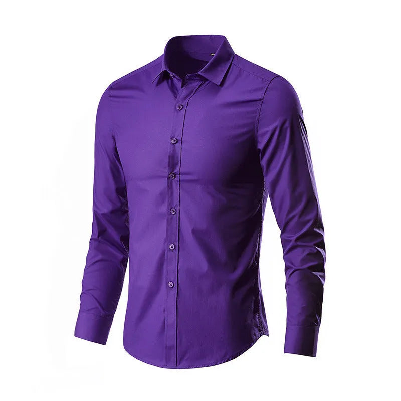 Man wearing a simple long-sleeve linen shirt in a loose fit, available in multiple colours and sizes.