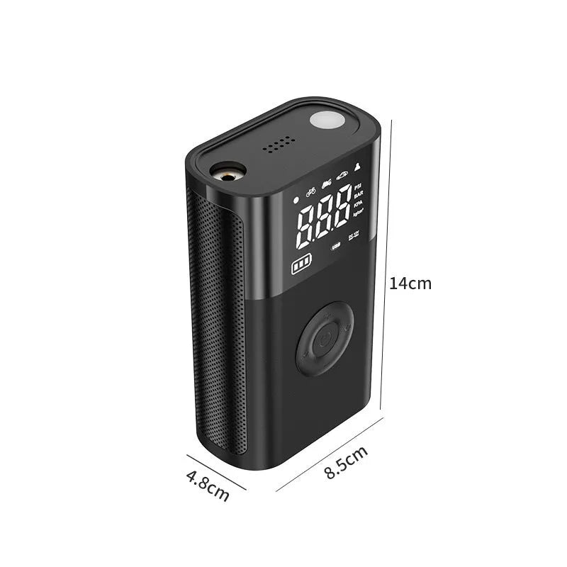 Wireless handheld digital display air pump with LED light and various nozzle attachments on a grey background.