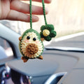 Handmade crocheted wool car pendant in avocado, pink rainbow, or red rainbow colours with cartoon styling