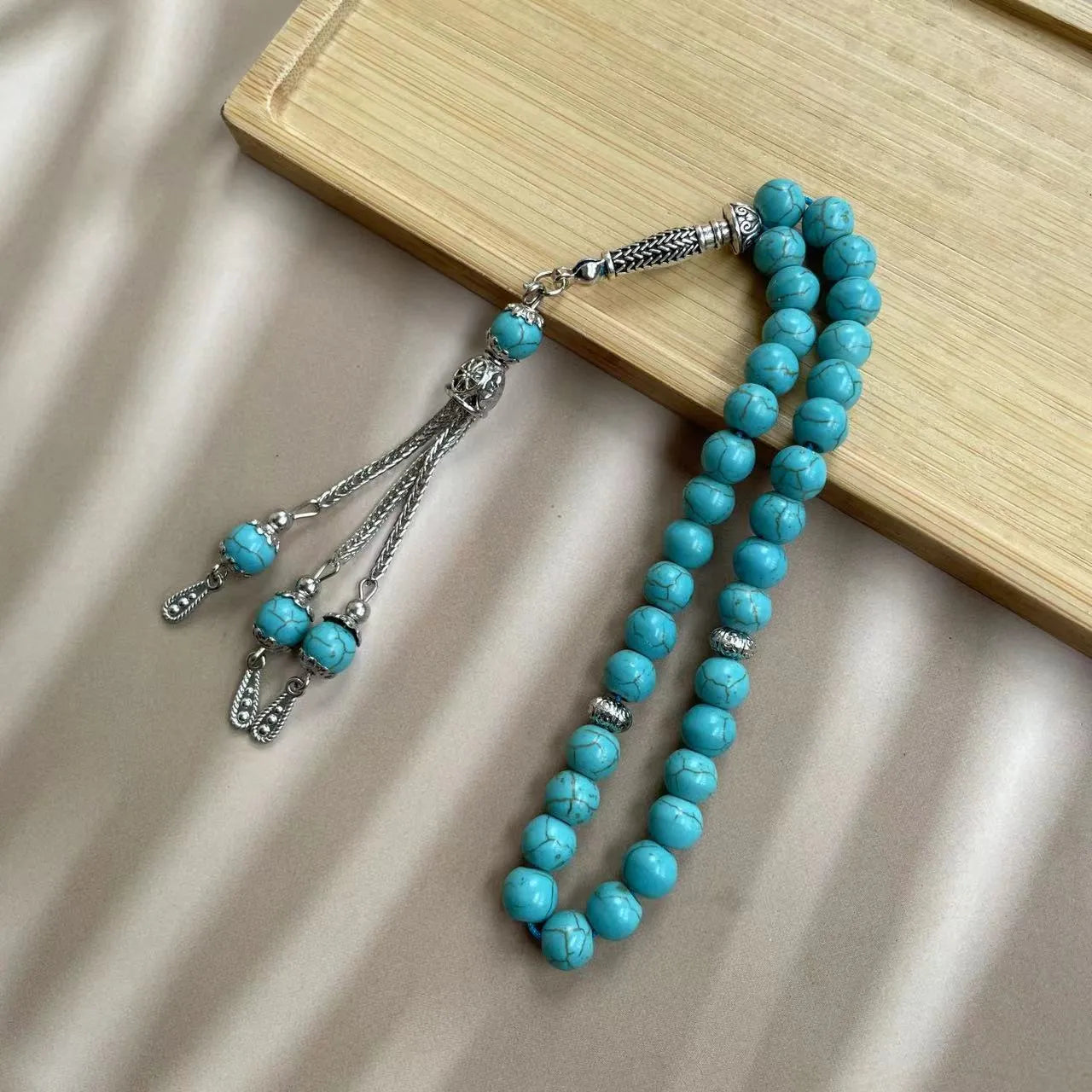 Handmade Muslim worship bracelet with sky blue stone beads for prayer counting