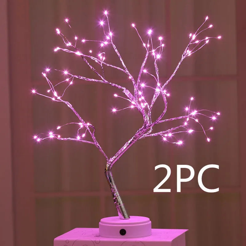 White LED Christmas tree shaped night light with touch base, standing 50cm tall on a table.