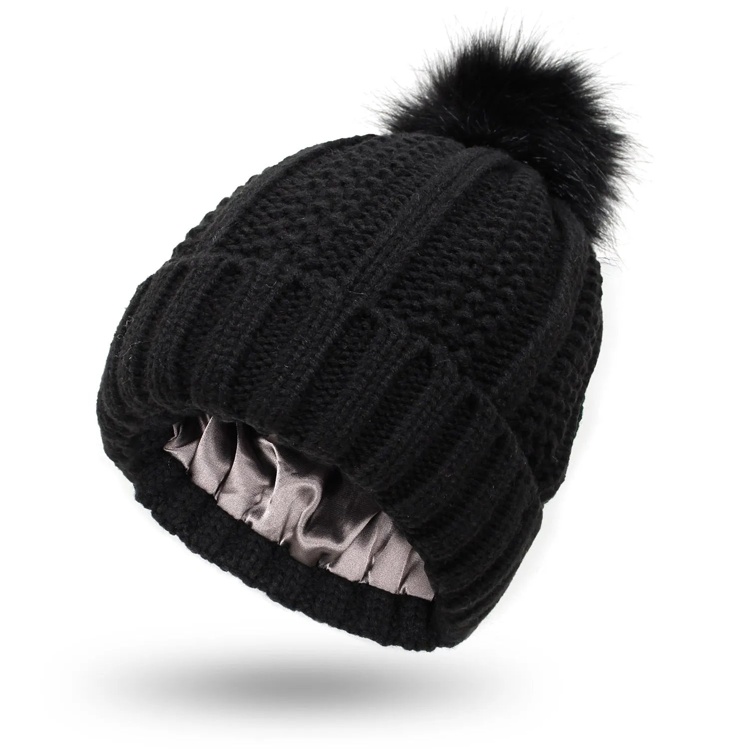 Wool knitted beanie hat with satin lining and faux fur pom pom in beige colour