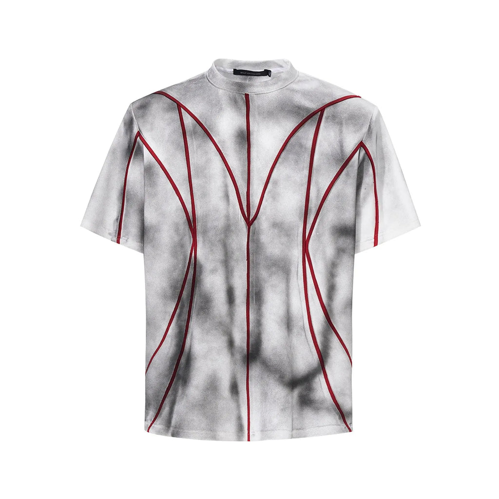 Women's padded shoulder short sleeve T-shirt with textured line patchwork design on front.