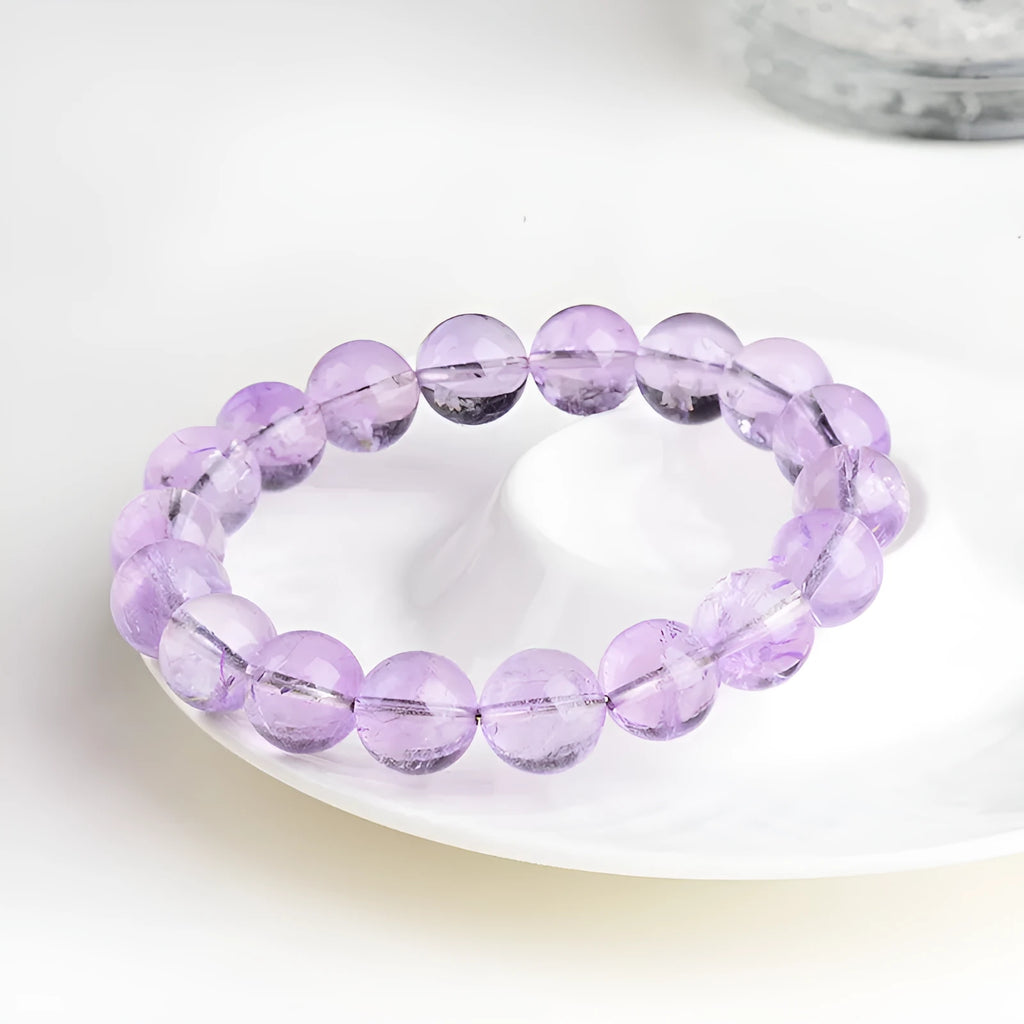 Lavender amethyst round bead bracelet with water ripple pattern showing cream and transparent colour options