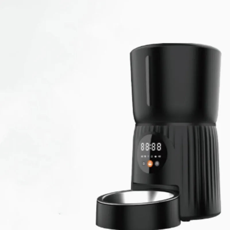 Black intelligent pet feeder with LCD screen showing feeding schedule and portion settings