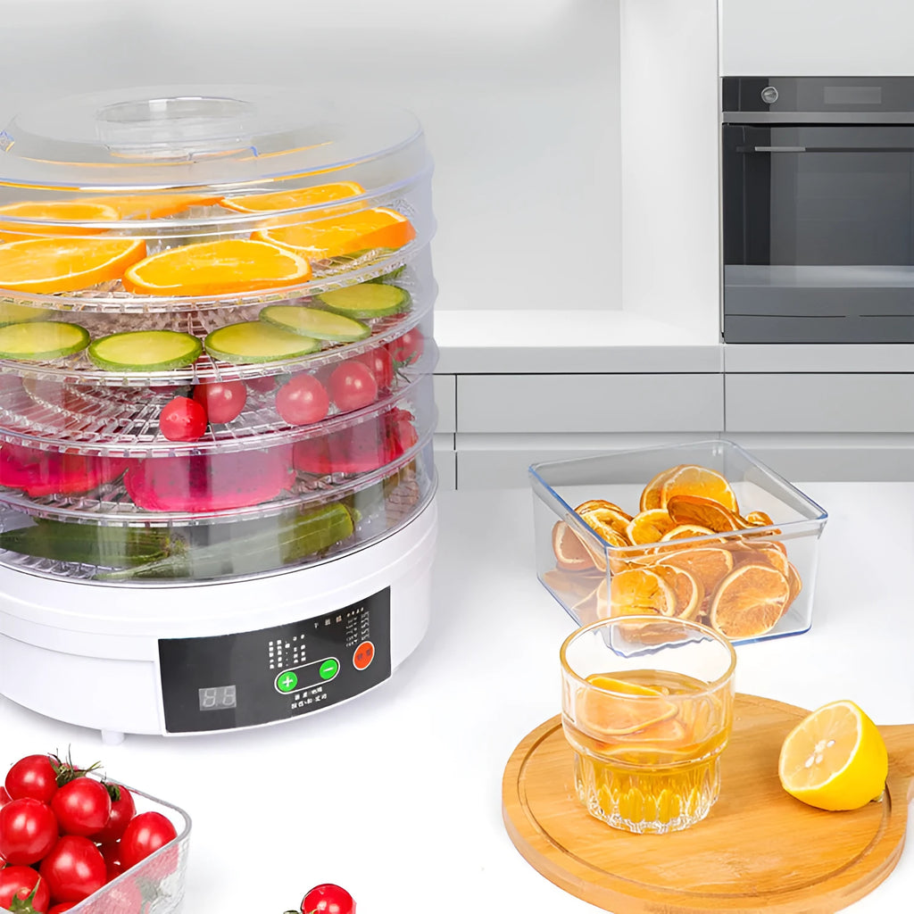 White five-tray food dehydrator with UK plug on kitchen countertop