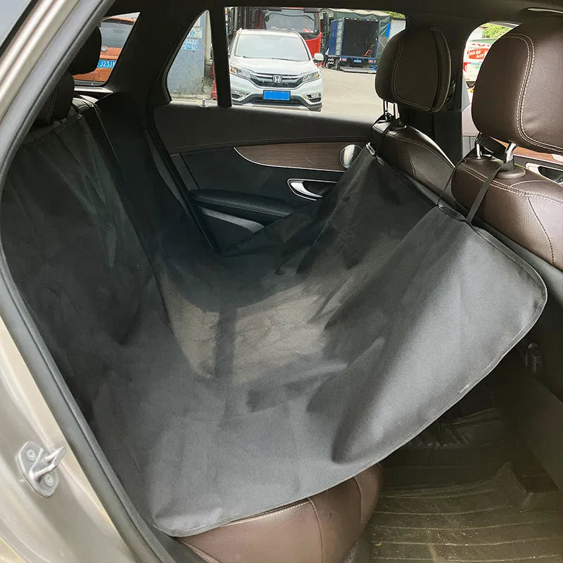 Waterproof car rear seat pet mat with non-slip backing in grey with dog footprint pattern