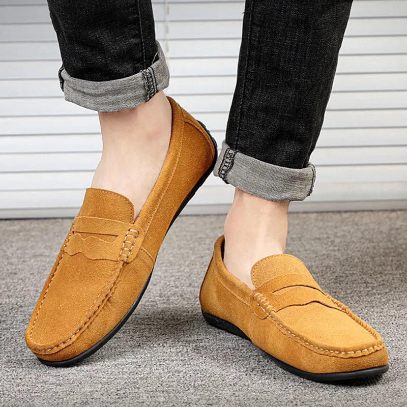 Men's suede leather slip-on loafers in various colours with a flat rubber sole and round toe