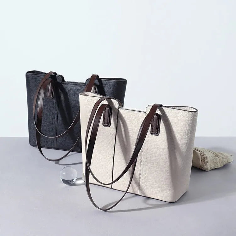 Genuine leather women's shoulder bag in box-type shape with sandwich pocket exterior