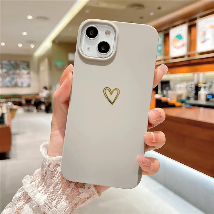 Brown silicone iPhone case with a hot-stamped love heart design on the back
