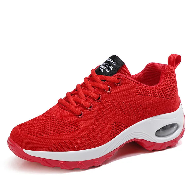 Women's black mesh sneakers with round toe and front lace-up design showing 3-5 cm mid heel