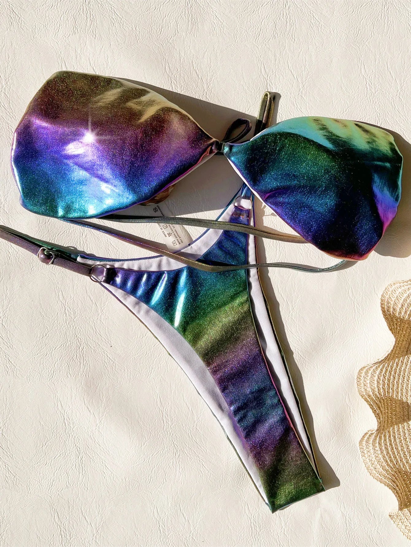 Women's purple gradient bikini swimsuit set on mannequin
