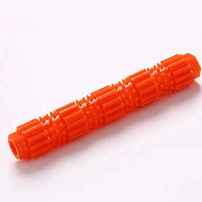 Green and orange durable rubber dog chew toy with treat-dispensing hole for aggressive chewers.