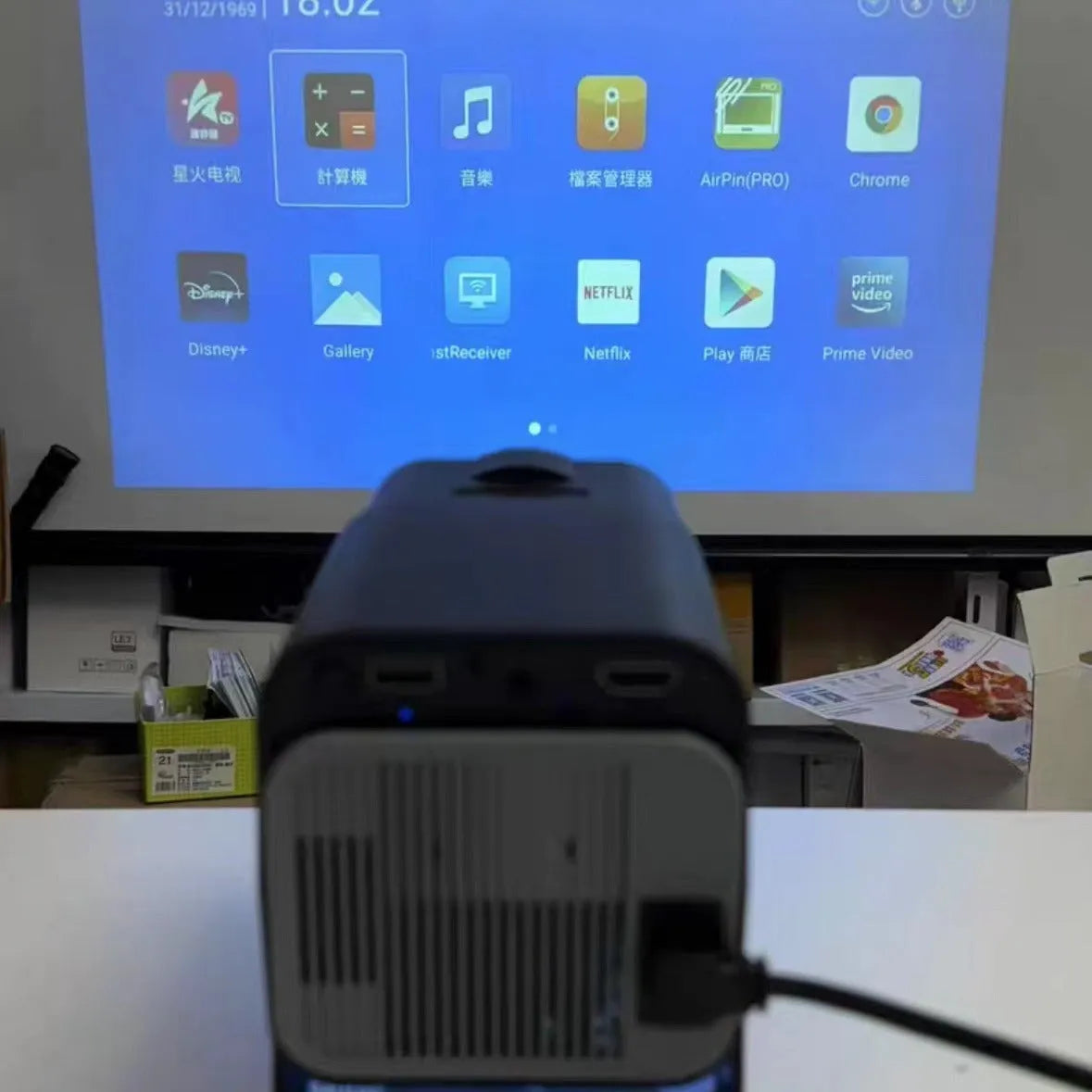 Wireless HD home projector with 720p resolution for gaming and movie viewing