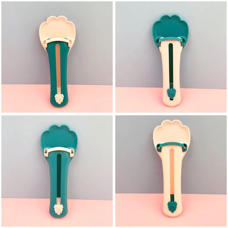 22cm green and pink pet food squeezer scoop with clear reservoir and soft silicone tip