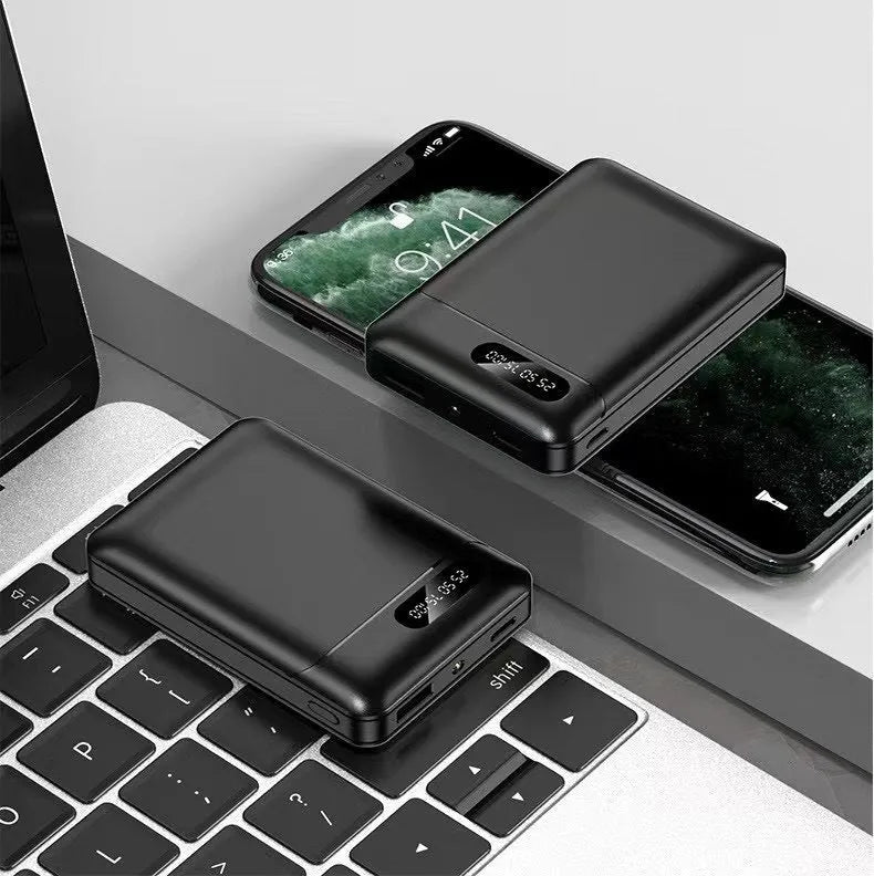 White or black portable power bank with multiple USB ports showing compact 92x63x23mm dimensions