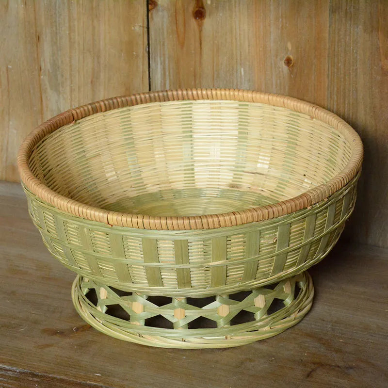 Handmade natural bamboo storage basket shown in one of three size options for household organisation.