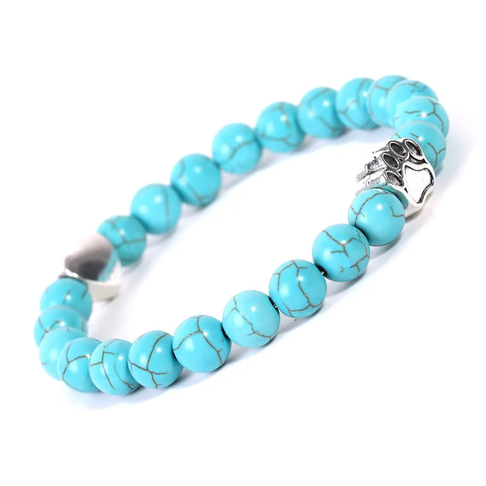 Tigereye Indian Agate stone beaded dog's paw bracelet on wrist, showing geometry shape and round beads.