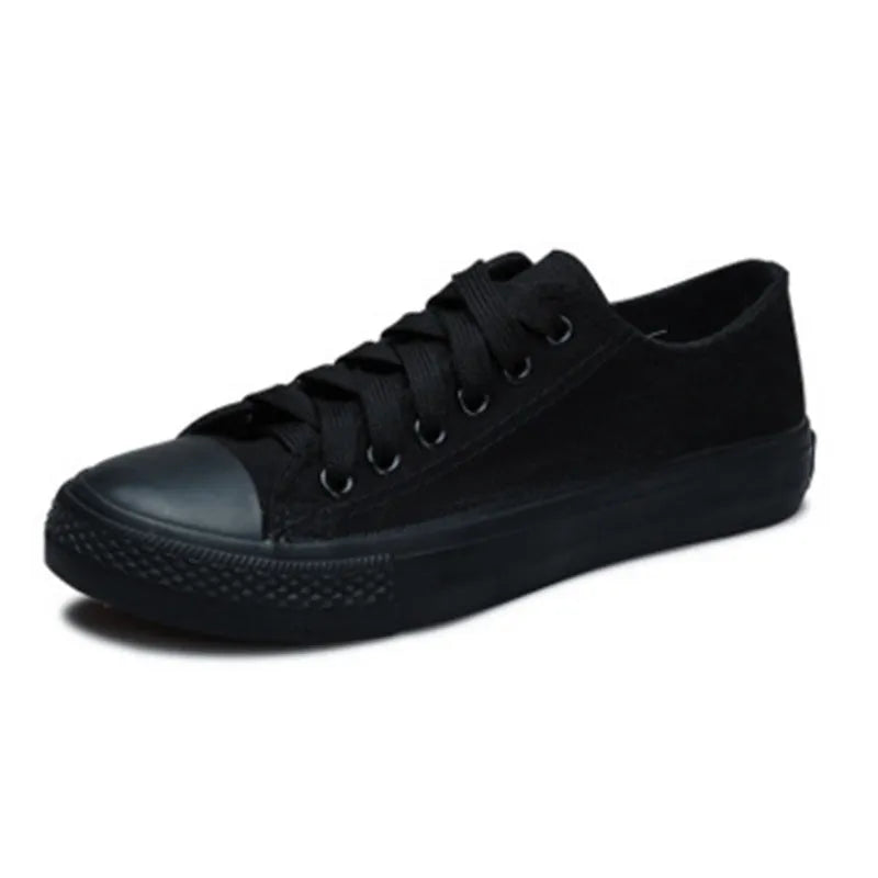 Women's solid colour casual canvas shoe on a white background.