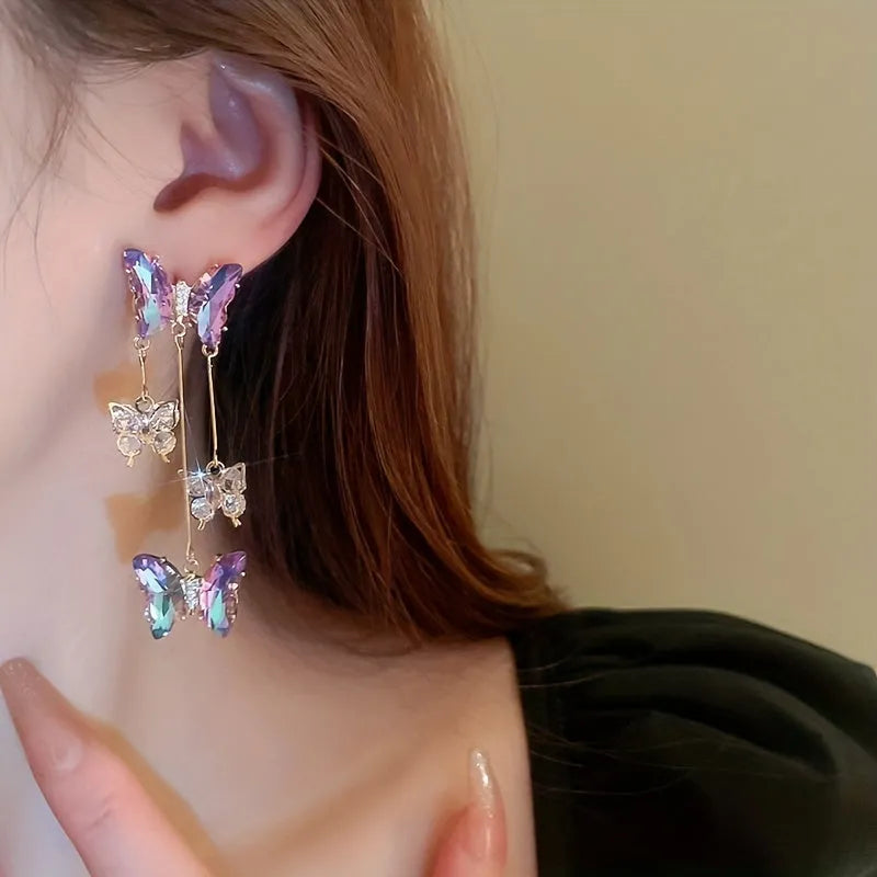 Silver needle blue purple butterfly tassel earrings with crystal flowers for women.
