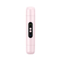 Pink and white portable electric body hair trimmer depilator with USB charging cable on a plain background.