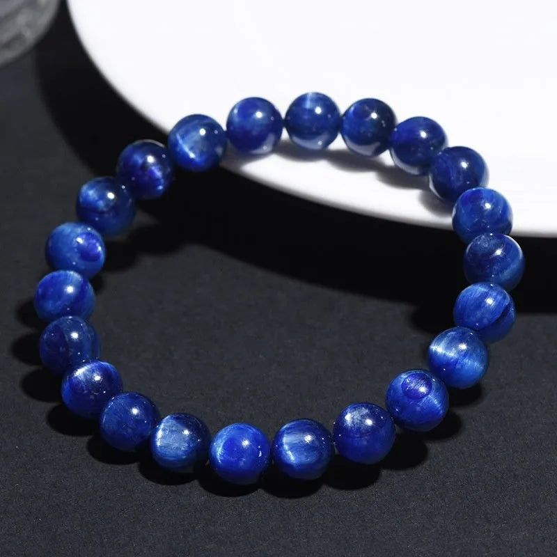Natural blue crystal bracelet with Ruyi charm in polished 7A grade crystal for trade fair gifts.