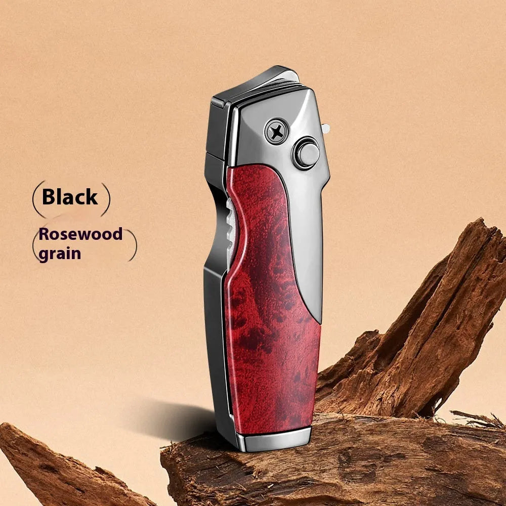 Zinc alloy folding lighter tool with integrated knife in a black wood grain finish.